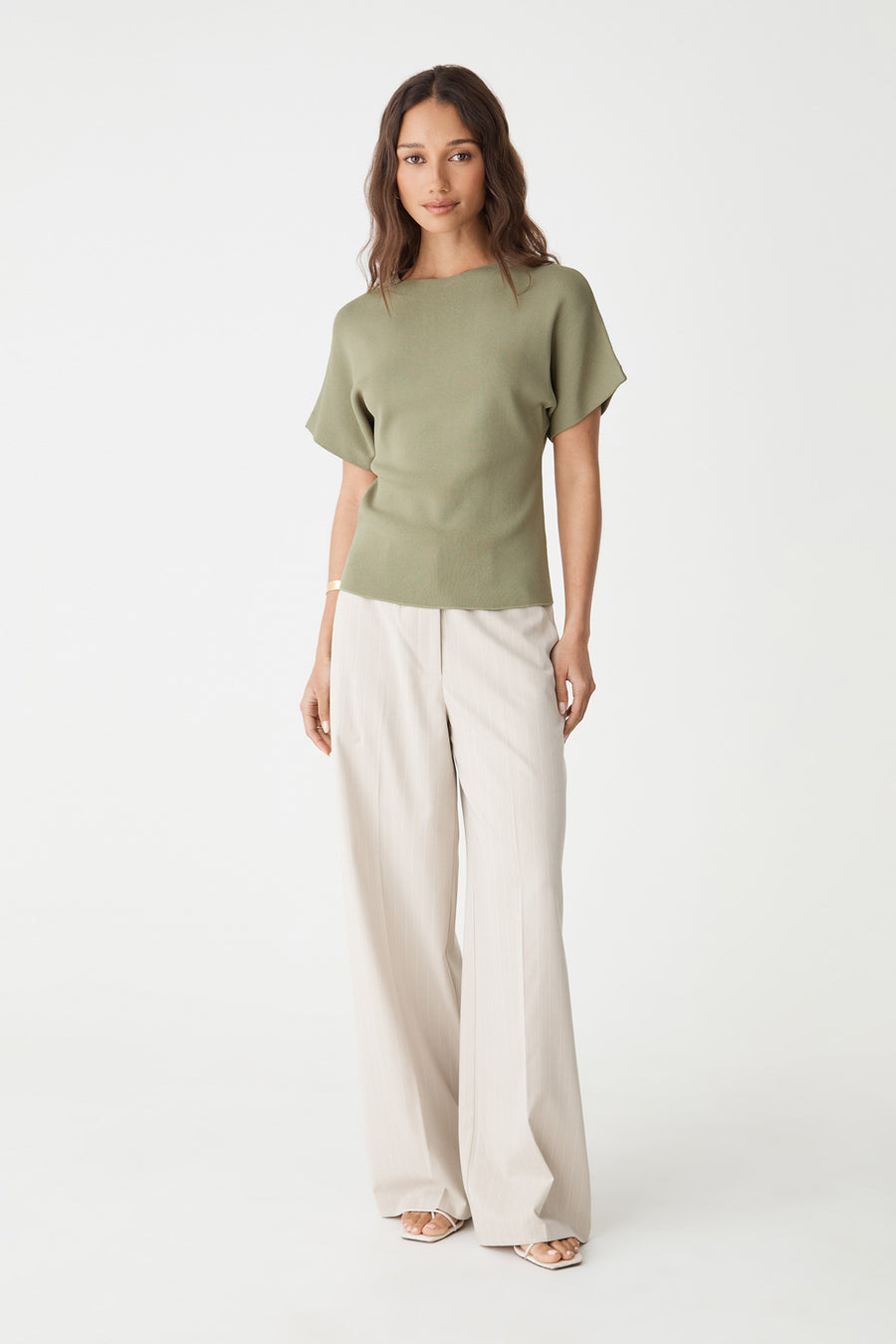Jemma Relaxed Knit Top in soft khaki, front view worn with cream wide-leg trousers