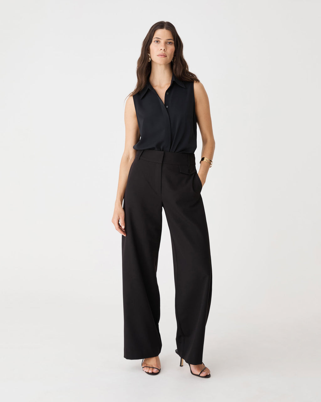 Milton Wide Leg Pants in black, front view worn with a black sleeveless shirt