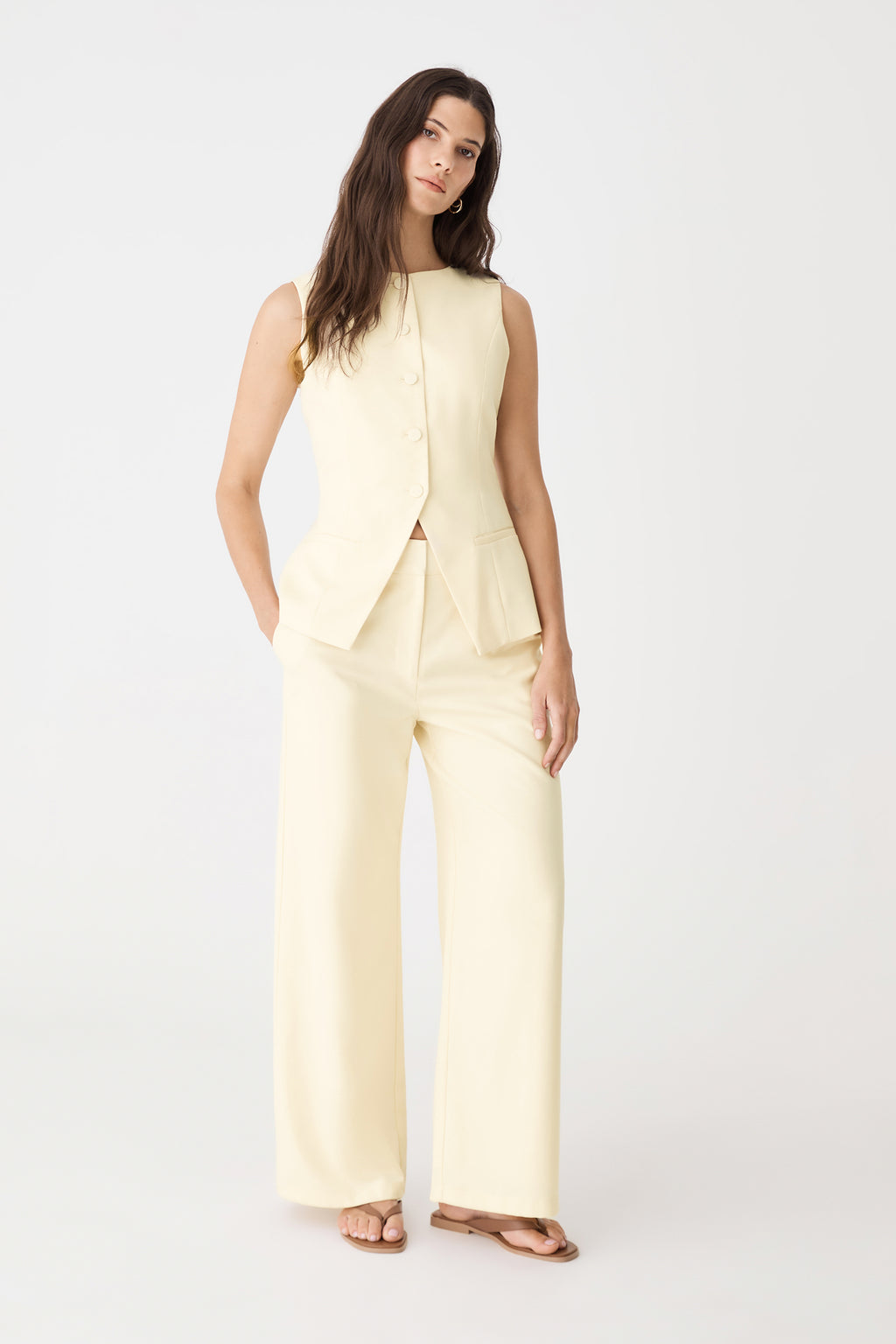 Front view of the butter wide leg pants and matching vest, full length
