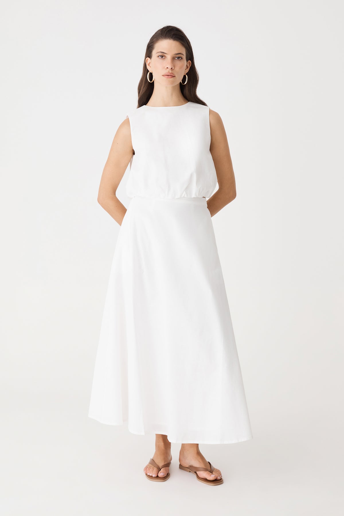 Kenya 2 Ruched Linen Top in ivory, front view, worn with matching ivory linen skirt