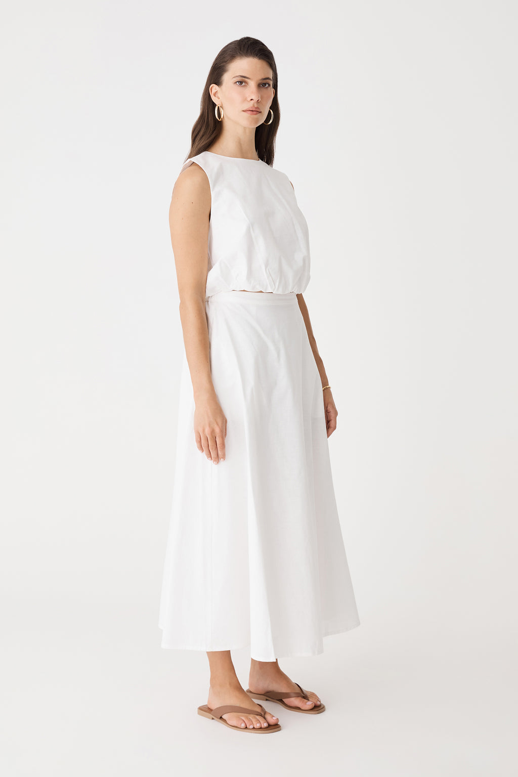 Side view of the ivory top and matching skirt