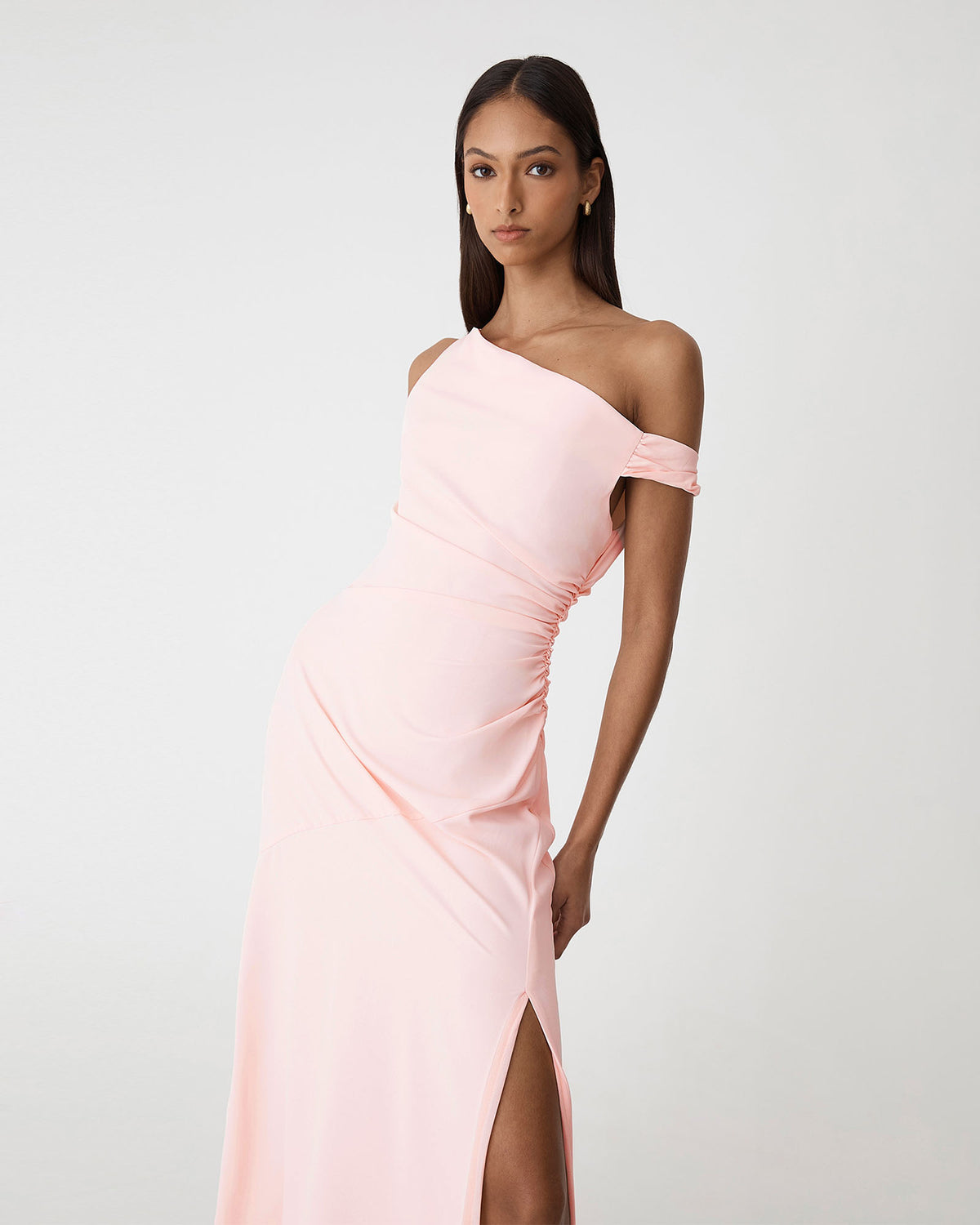 Afina One Shoulder Twist Dress in soft pink — close-up view