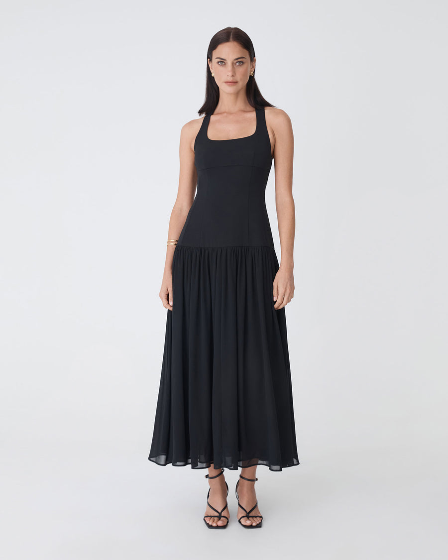 Selena Dropped Waist Dress in black — full-length view