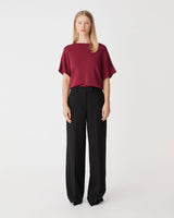 Jemma Relaxed Knit Top in deep red — full-length view