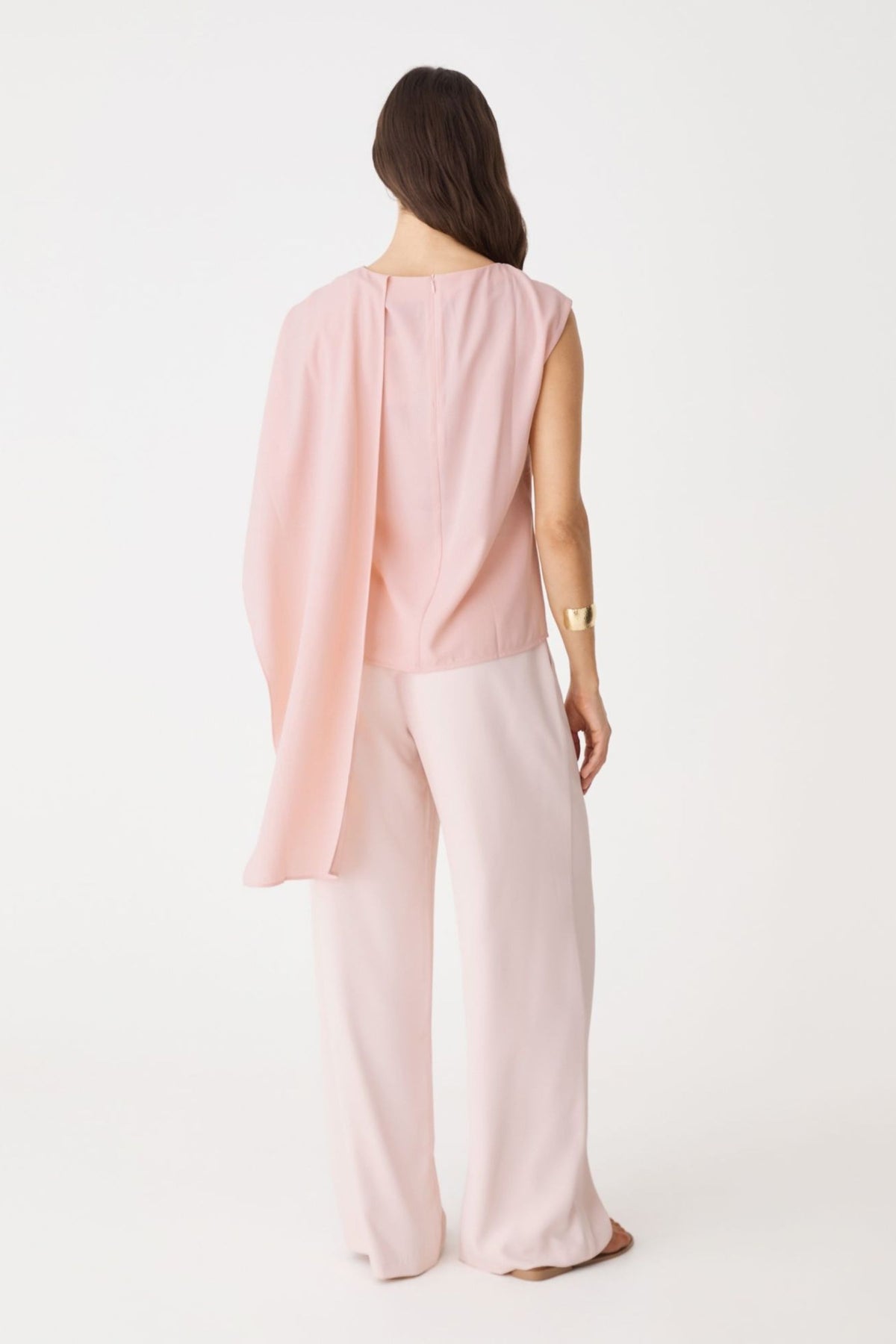 Back view of the Fairy Floss pleated wide-leg pants worn with a pink top