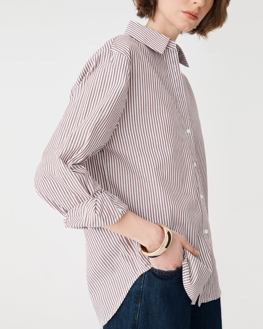 Side view showing dropped shoulder and vertical pinstripes