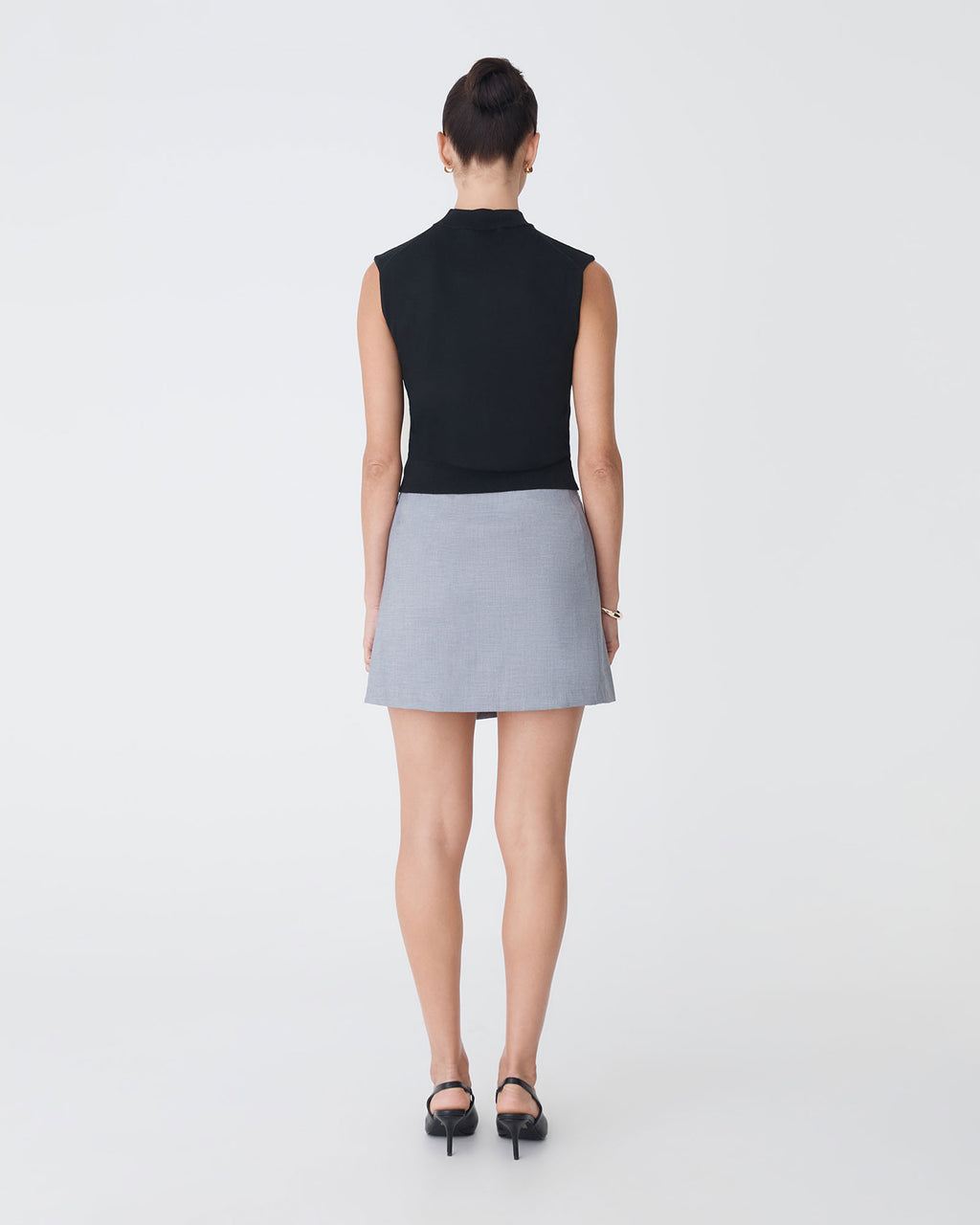 Dina Mock Neck Knit Top in black — back view