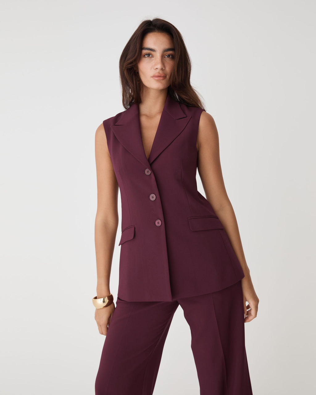 Nikki Long Collared Vest in bordeaux — close-up view