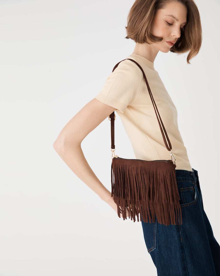 Tulum Fringe Bag in Chocolate Fondant worn crossbody at the hip, side view showing tiered front fringe