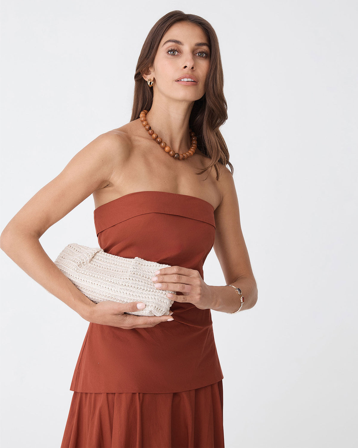 Coral Raffia Clutch Bag in ivory — close-up view 2
